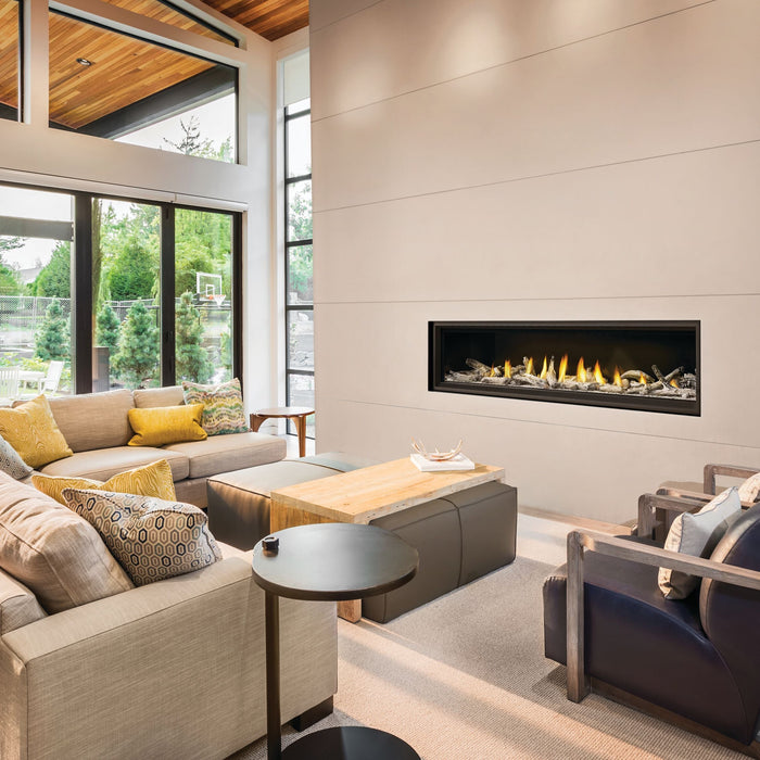 Napoleon Vector 74 linear gas fireplace in a bright living room with a wood ceiling and tall windows