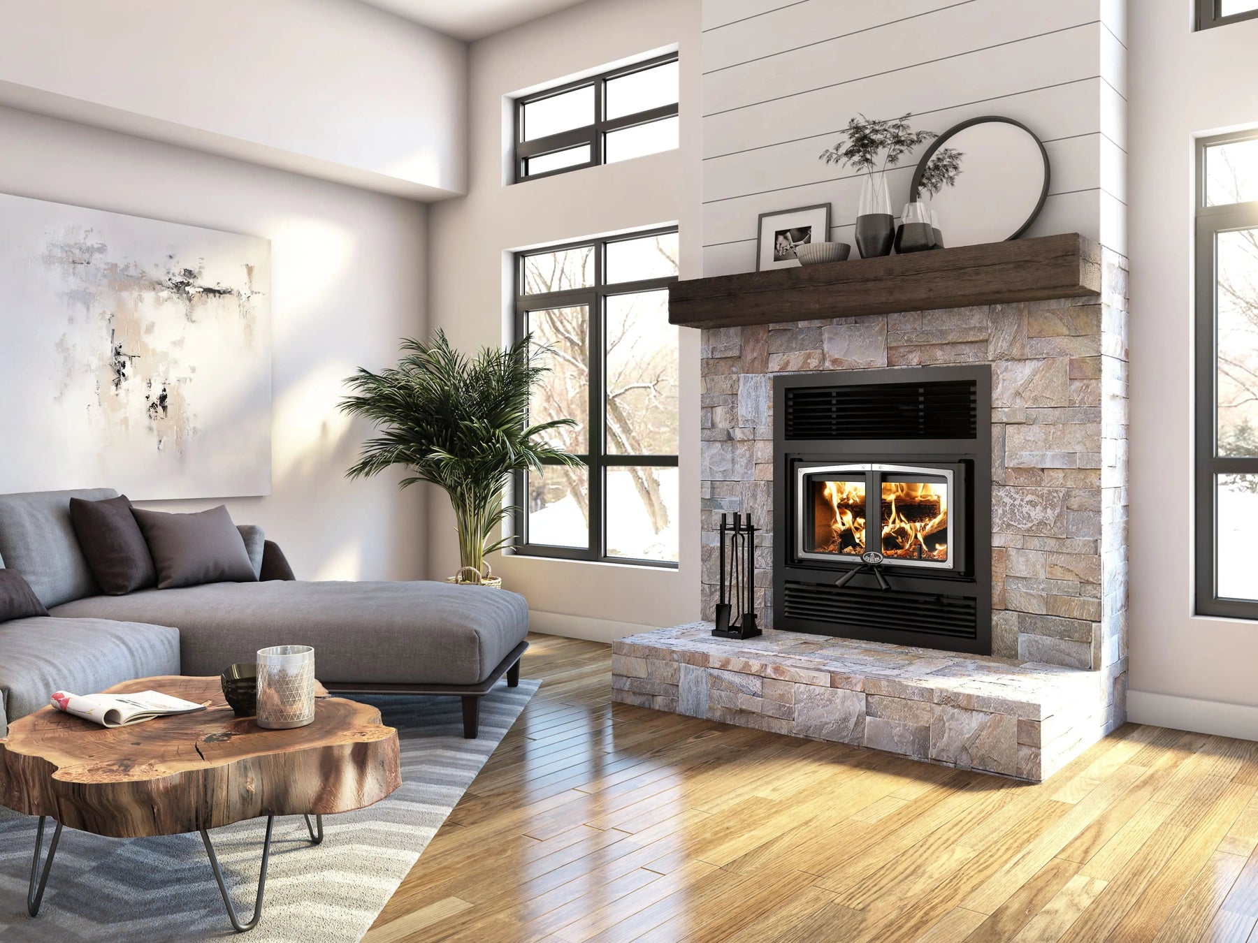 Osburn Everest III EPA certified wood fireplace in a stone surround with a wood mantel