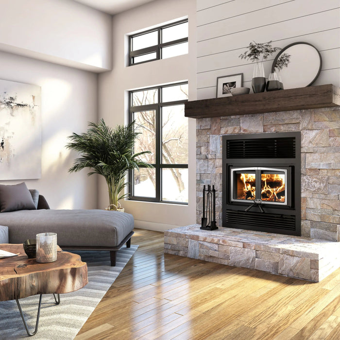 Osburn Everest III EPA certified wood fireplace in a stone surround with a wood mantel