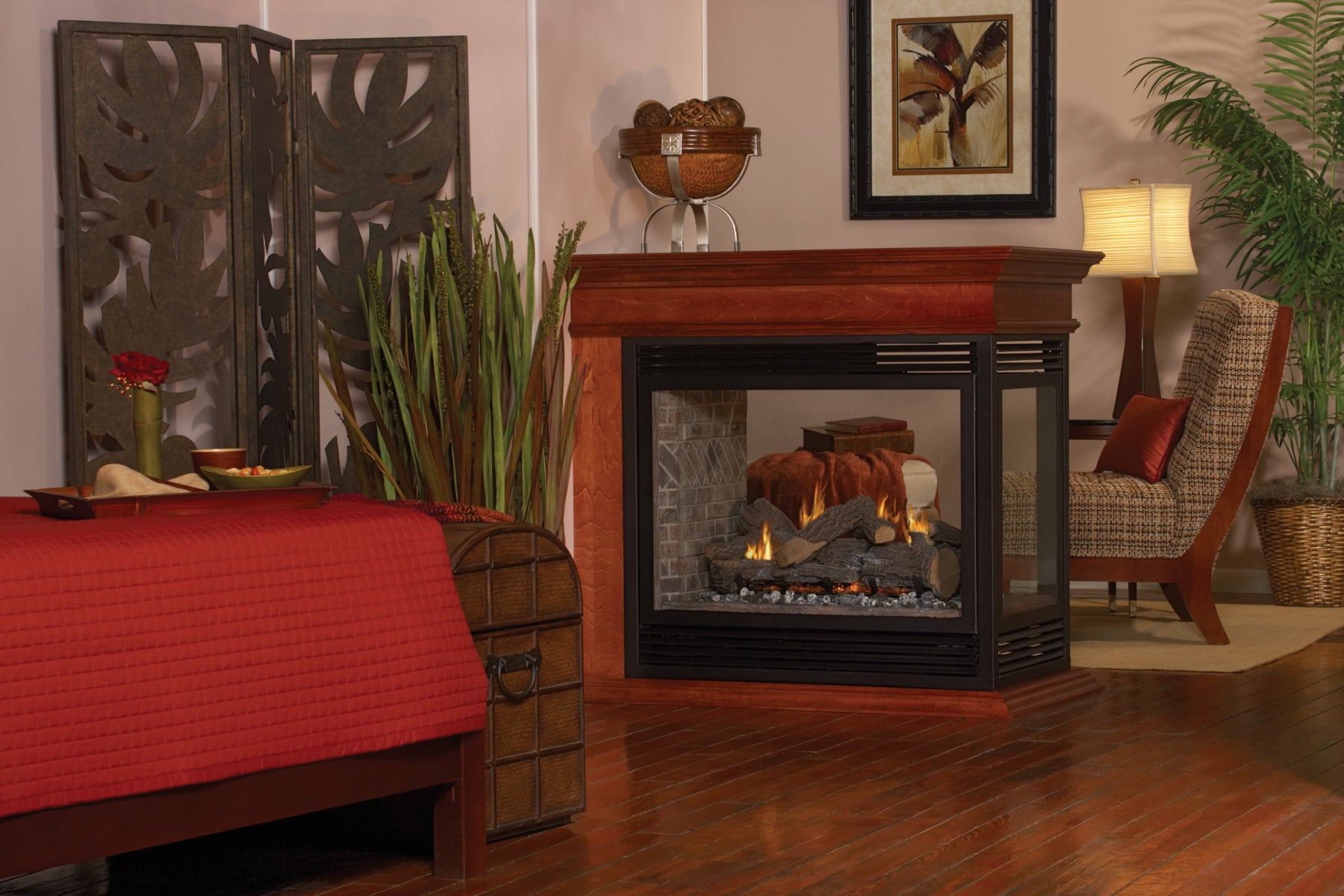 Empire Tahoe Peninsula 36 inch gas fireplace with glass on three sides in a living room