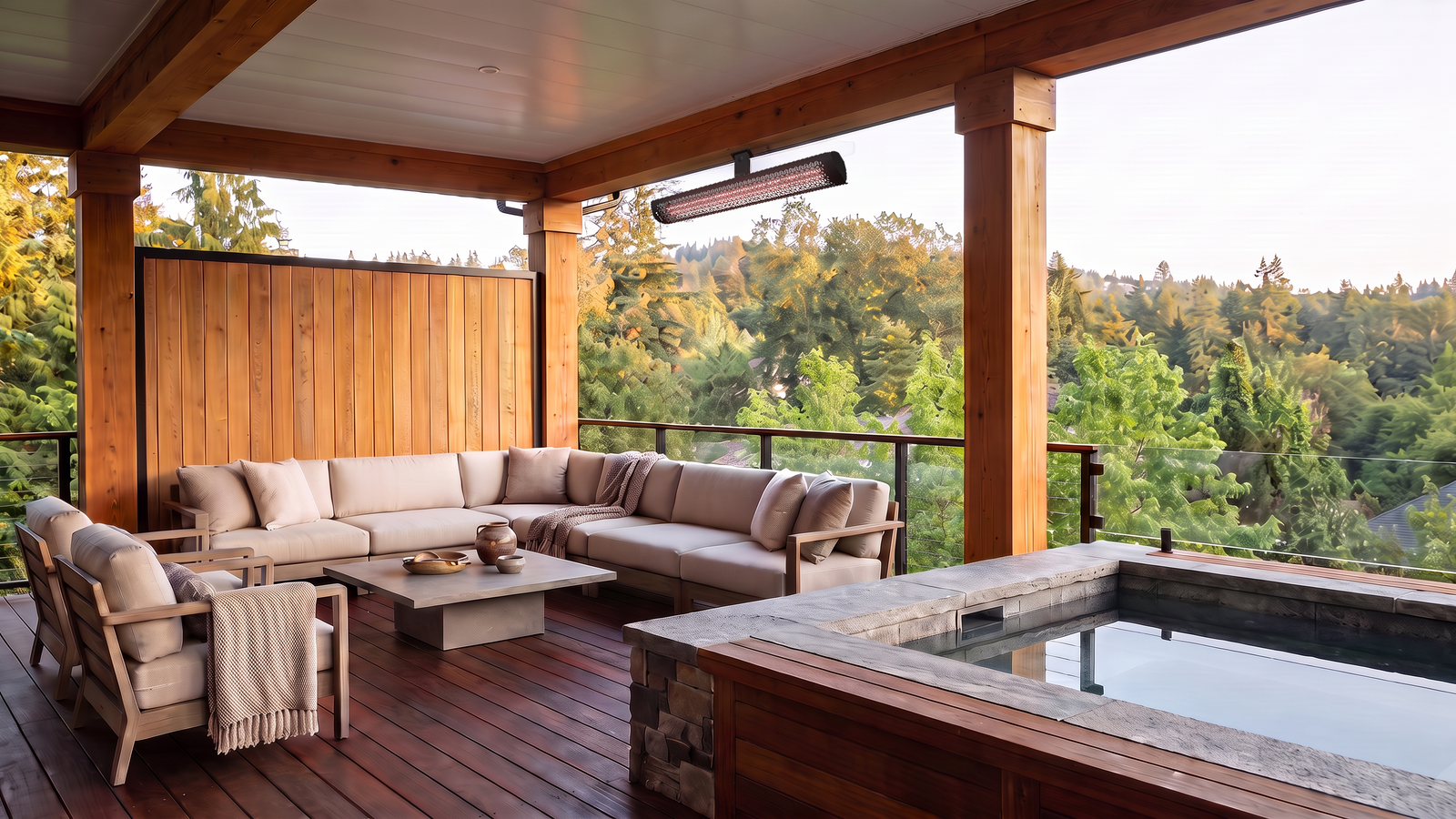 Black Bromic Tungsten Electric Select heater under a covered deck roof beside a hot tub