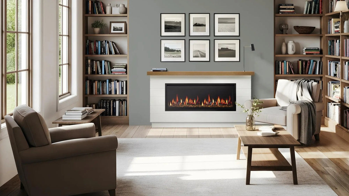 Linear electric fireplace built into a white wall between bookshelves in a living room
