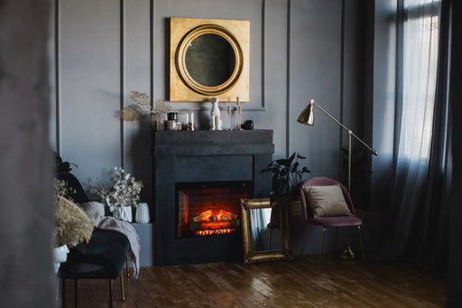 Amantii Classic Edition Electric Fireplace by Fire & Ice - installed in a dark mantel in a moody sitting room