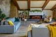Amantii Signature MultiView Holo Electric Fireplace - installed in a white wall in a rustic living room