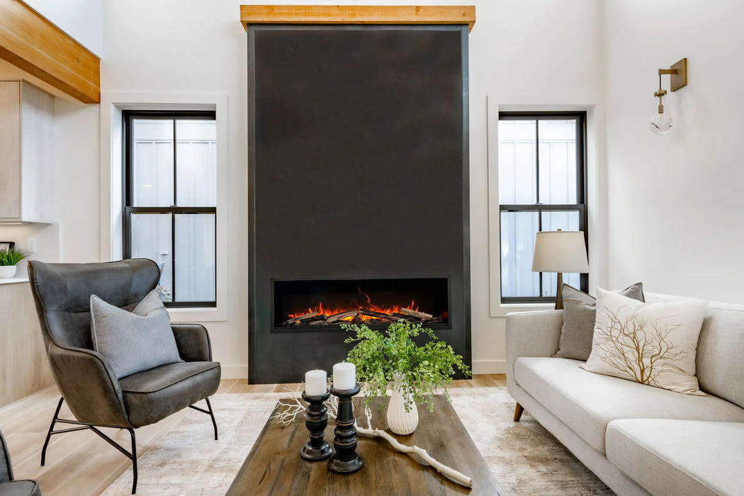 Amantii Symmetry Bespoke Extra Tall Electric Fireplace - installed in a dark column in a white living room