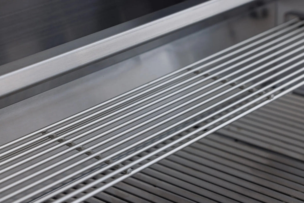 Blaze BCM grill warming rack above the cooking grates, close-up