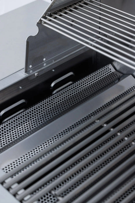 Blaze BCM grill perforated flame tamers with the cooking grates removed, close-up