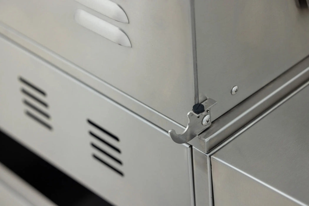 Stainless steel hook on the rear corner of the Blaze LTE PRO grill, close-up
