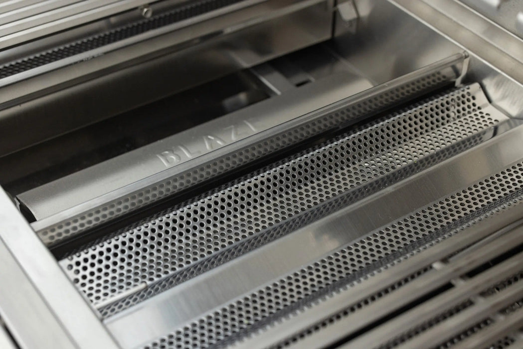 Blaze LTE PRO grill perforated flame stabilizing grids with the cooking grates removed, close-up