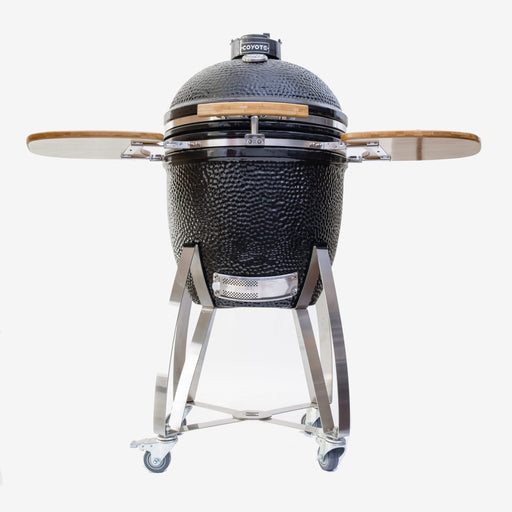 Coyote Asado smoker on the C1CHCS-CT stand with both side shelves up