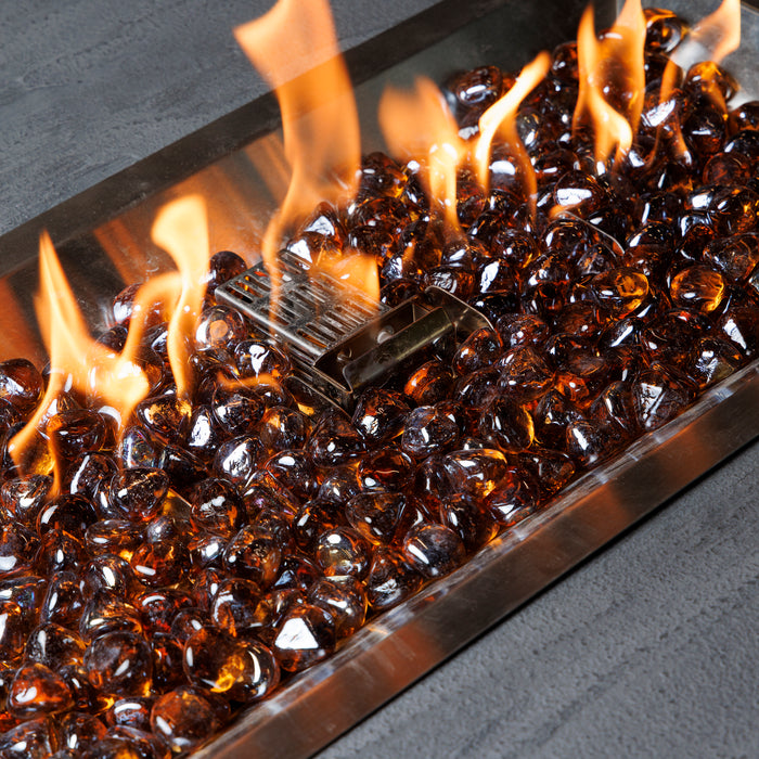 The Outdoor GreatRoom Copper fire glass diamonds burning in a gas fire pit