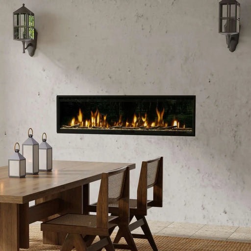 Dimplex Ignite Evolve linear electric fireplace, installed in a stone wall beside a dining table