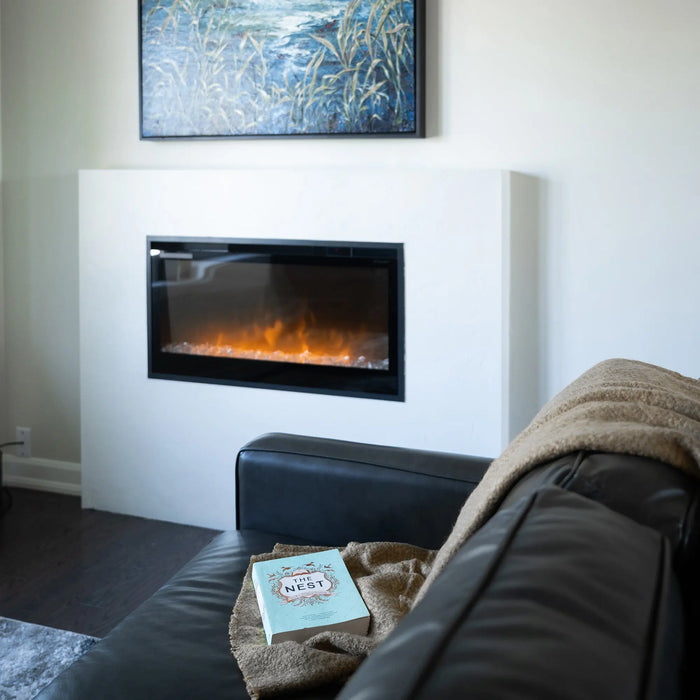 Dimplex Multi-Fire 42" Slim Linear Electric Fireplace - installed in a white surround below artwork