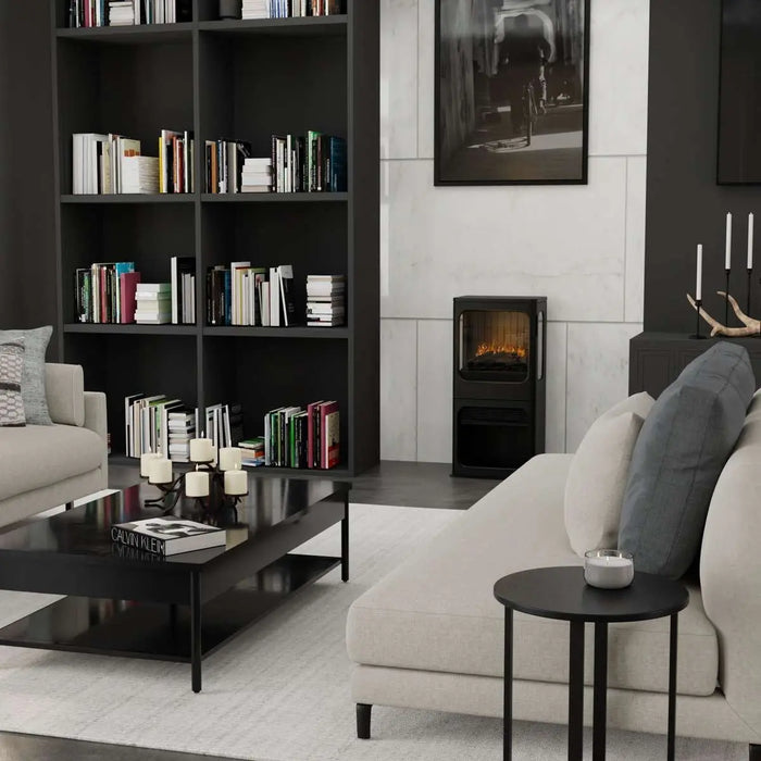 Dimplex Optimyst Mapleton Electric Stove MPT-LS-AM - in a living room beside bookshelves