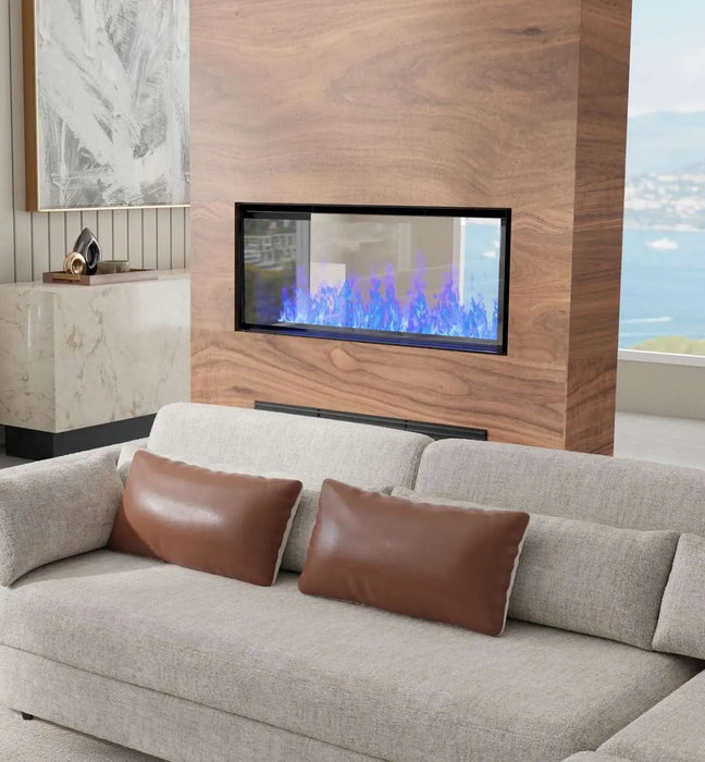 Dimplex Optimyst RGB Pro Box 40" Vapor Fireplace - installed as a see-through in a wood divider wall with blue flames