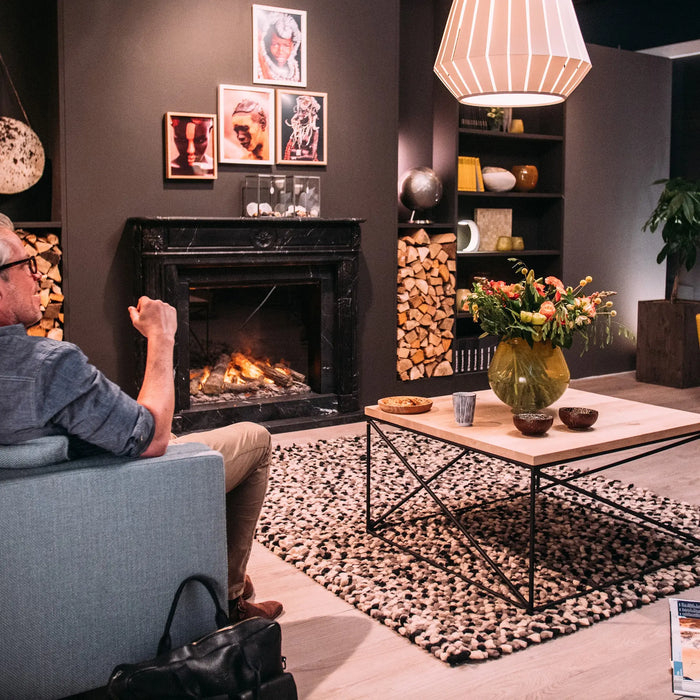 Dimplex Optimyst e-MatriX 35" Electric Firebox, Front-Facing FEF3226L1 - installed in a black traditional mantel in a living room