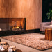 Dimplex Optimyst e-MatriX 37" Electric Firebox, Left-Facing FEF3226L2L - installed in a wood-paneled wall above a low hearth