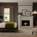 Dimplex Revillusion Built-In Electric Firebox, Black - installed in a white mantel surround in a bedroom