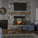 Dimplex Revillusion 36" Portrait Built-In Electric Firebox, Neutral Brick REV36P-NB - installed in a stone fireplace below a wood mantel and TV
