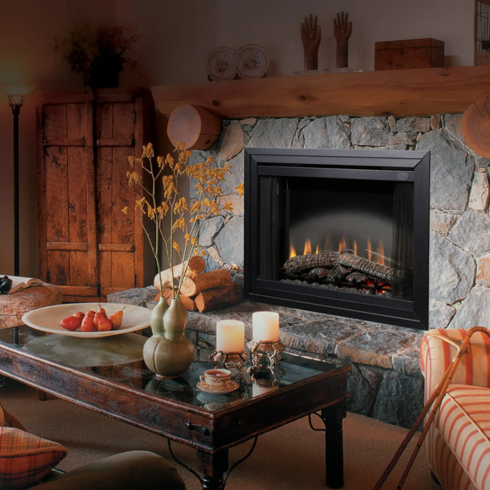 Dimplex Standard 39" Built-in Electric Firebox - installed in a stone fireplace with a log mantel in a rustic living room