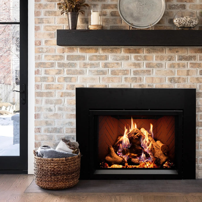 Empire 34" Rainier Premier insert in a brick fireplace with black mantel, close view