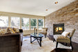 Empire Stove 38" St. Clair 4300 Wood Burning Fireplace with Blower, installed in a brick wall in a living room