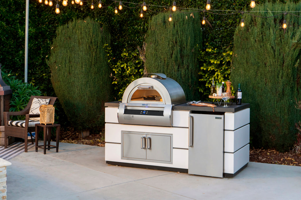 Fire Magic Echelon Diamond 5660 Built-In Gas Pizza Oven with Black Glass in an outdoor kitchen