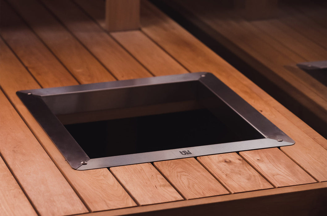 HUUM CLIFF/STEEL embedding flange installed in a wood sauna bench