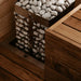 HUUM STEEL sauna heater recessed into a sauna bench with the embedding flange