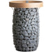 HUUM HIVE sauna heater filled with stones with the safety rail installed