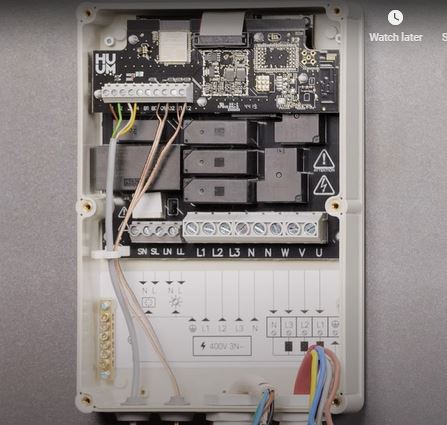 HUUM UKU main control module with the cover open, showing the wiring terminals