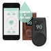 HUUM UKU sauna controls in wood and black beside the HUUM mobile app