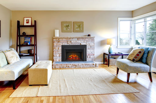 SimpliFire 30" electric fireplace insert with standard front in a stacked-stone fireplace