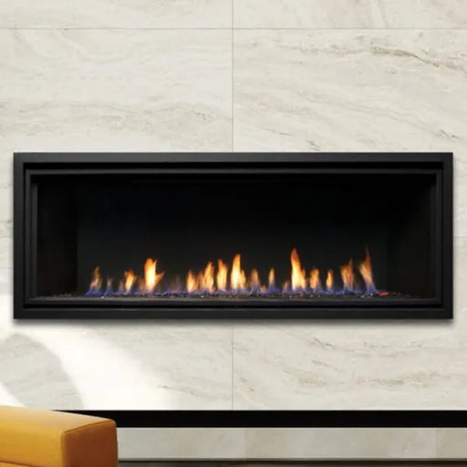 Kingsman ZCVRB47 linear gas fireplace in a marble-look wall with fire glass flames