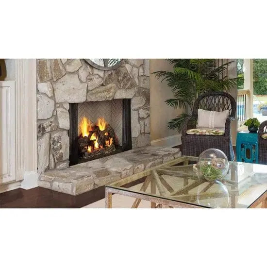 Majestic ASH36-B Ashland 36" Open Wood Burning Fireplace - installed in a stone wall in a sunroom