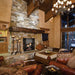 Majestic ASH36-B Ashland 36" Open Wood Burning Fireplace - installed in a stone wall in a lodge-style great room