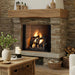 Majestic ASH50-B Ashland 50" Open Wood Burning Fireplace - installed in a stone fireplace with a wood mantel