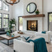 Majestic ASH50-B Ashland 50" Open Wood Burning Fireplace - installed in a white stone wall in a bright living room (view 2)