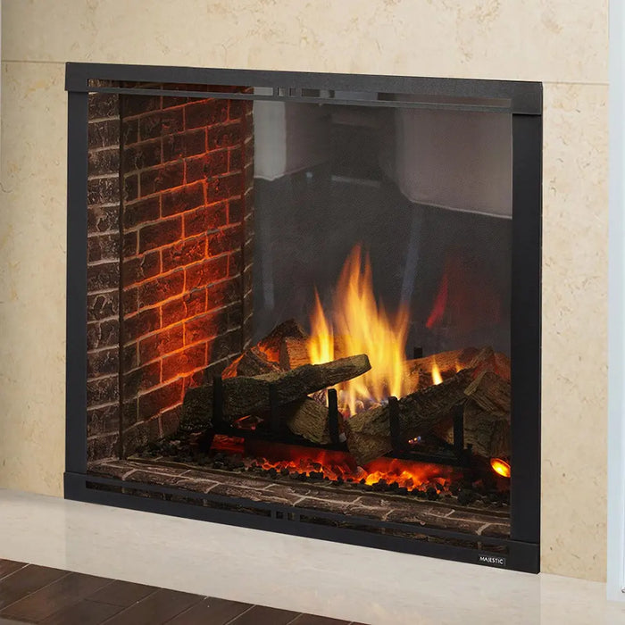 Majestic MARQ42STIN Marquis II 42" See-Through Direct Vent Gas Fireplace - see-through view installed in a light stone surround