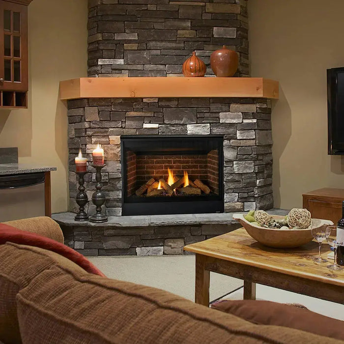 Majestic Quartz Direct Vent Fireplace - installed in a stone corner hearth