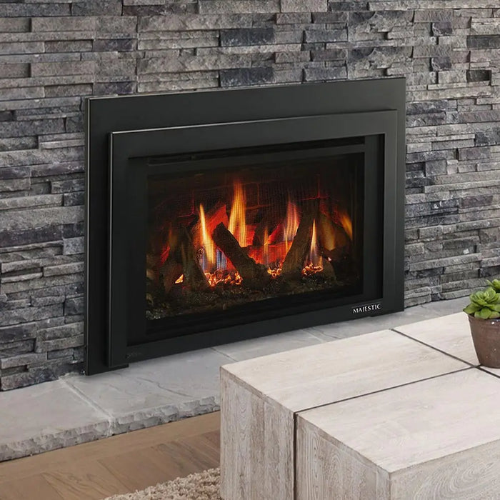 Majestic Ruby 25" Direct Vent Gas Fireplace Insert - insert installed in a dark stacked-stone wall (view 2)