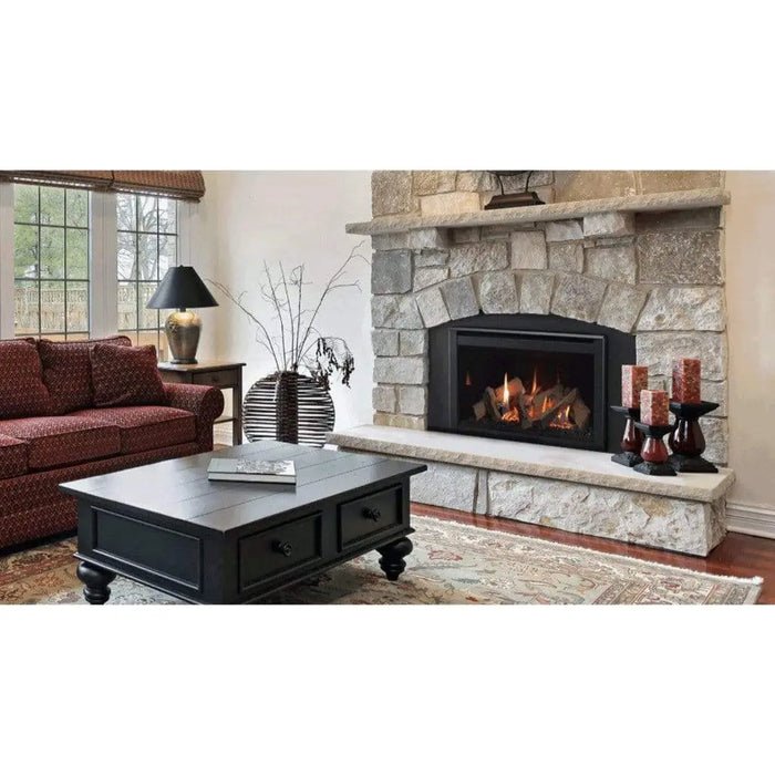 Majestic Ruby Freestanding 30" Direct Vent Propane Fireplace With Steel Cabinet - insert installed in a stone fireplace with a raised hearth in a living room