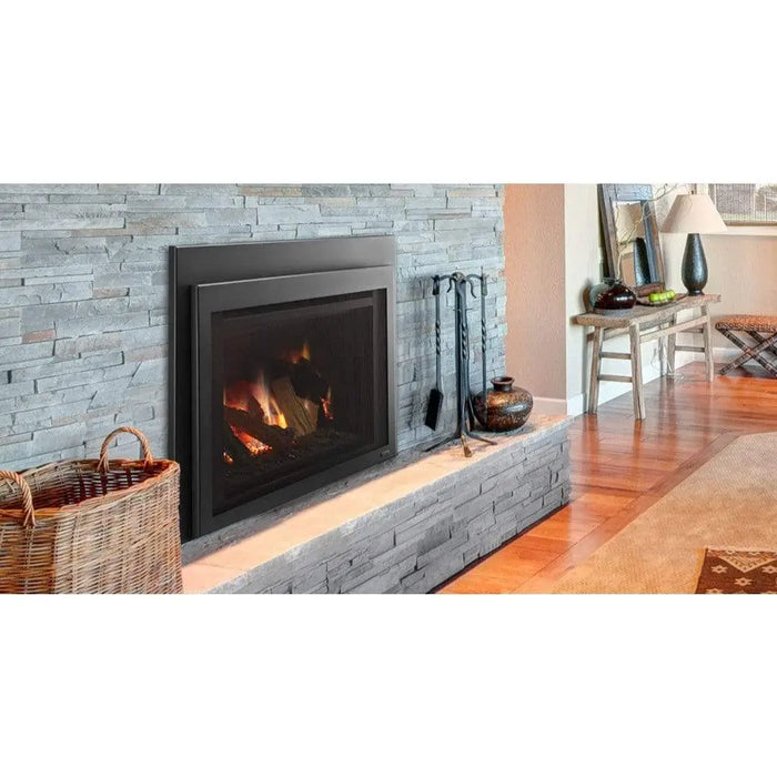 Majestic Ruby Freestanding 30" Direct Vent Propane Fireplace With Steel Cabinet - insert installed in a gray stone wall with a hearth