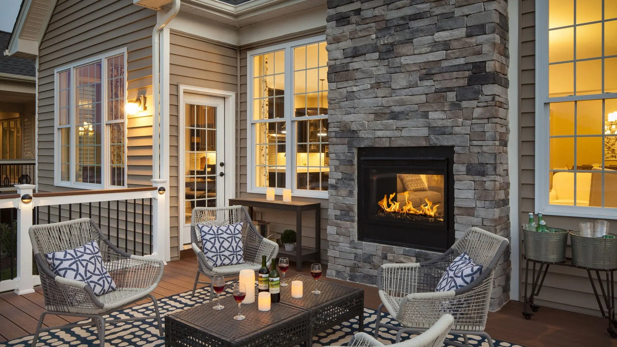 Majestic Twilight Modern see-through indoor/outdoor gas fireplace in a room