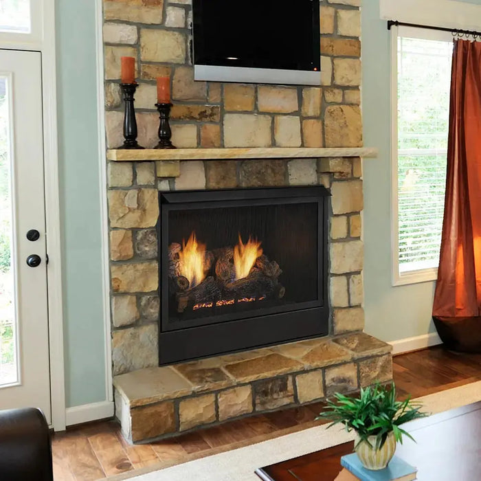 Monessen 32 in. Aria vent free fireplace VFF32 installed in a stone surround in a living room with a TV above