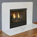 Monessen 36 in. Aria vent free fireplace VFF36, angled view in a white wall and hearth with brick panels and logs burning
