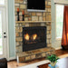 Monessen 36 in. Aria vent free fireplace VFF36, installed in a stone fireplace with a wood mantel shelf and TV above
