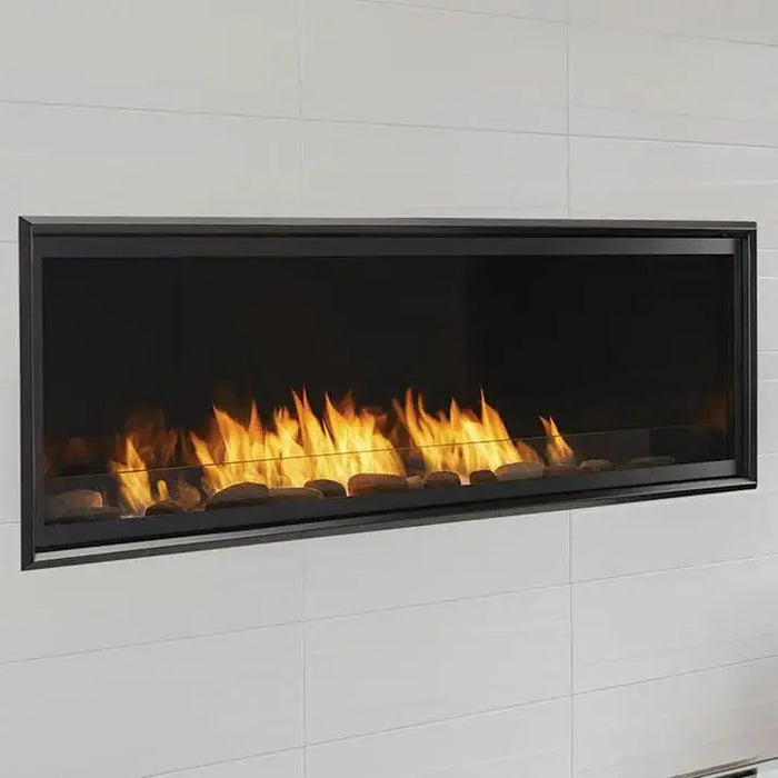 Monessen 42 in. Artisan vent free linear fireplace AVFL42 with black trim installed in a white tiled wall