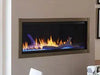 Monessen 72 in. Artisan vent free linear fireplace AVFL72 installed in a wall with a bronze-toned surround and blue-tinted flames