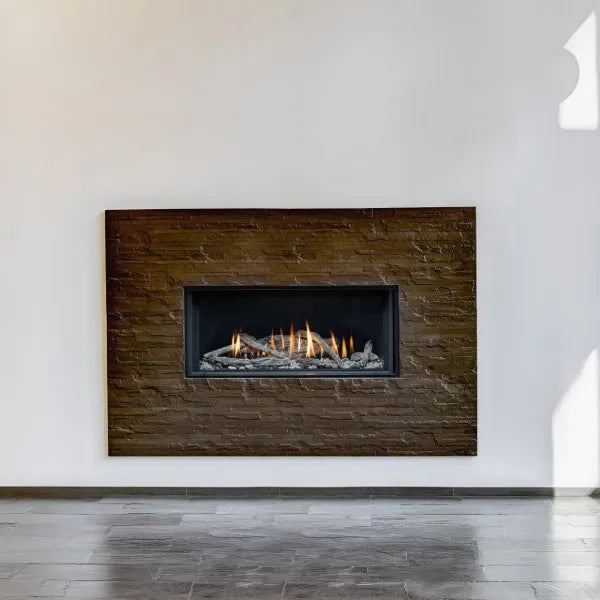 Sleek Montigo Distinction 36" Gas Fireplace with black reflective glass.